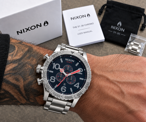 Nixon 51-30 Chrono All Silver Navy Red A083-307 worn on the wrist, showing the 51mm case size